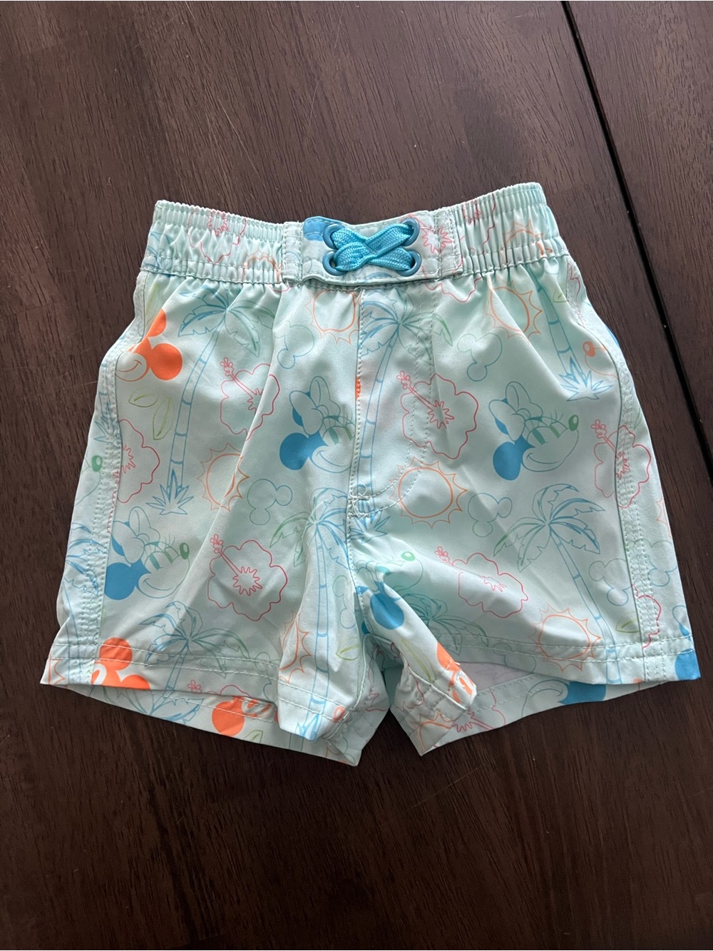 Disney Aqua Swim Shorts with Blue Drawstring and Tropical Print